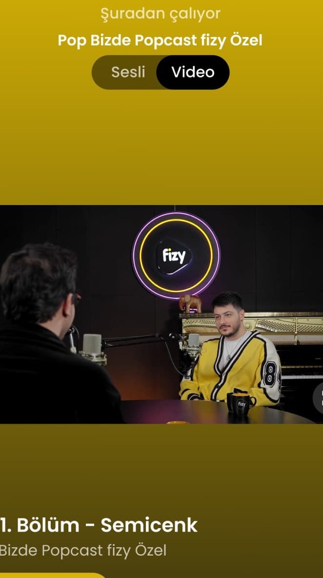 The fizy app playing a podcast episode with video